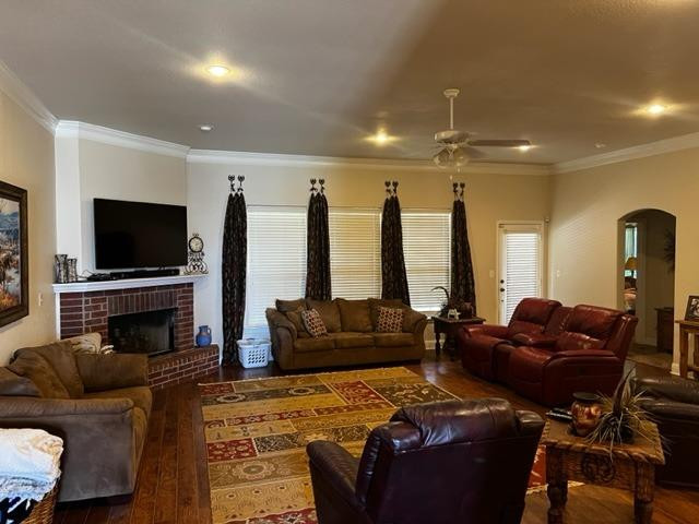 9104 Ridgely Avenue Lubbock, TX 79424 - Photo 8 of 19 a living room with furniture and a flat screen tv