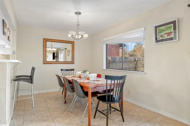 a bedroom with a bed and a table in it