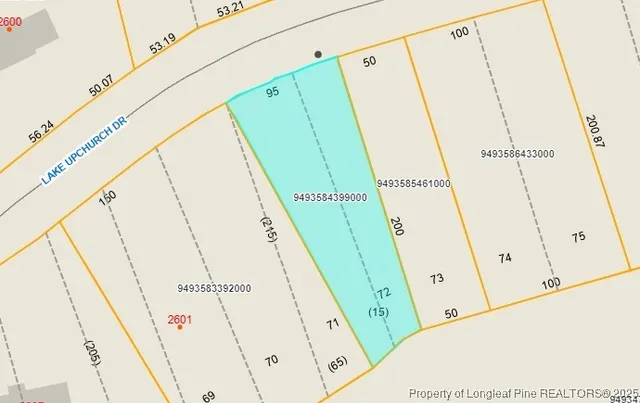 a view of a closet with wooden floor