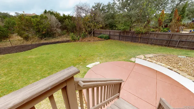 a view of a swimming pool with a lounge chairs