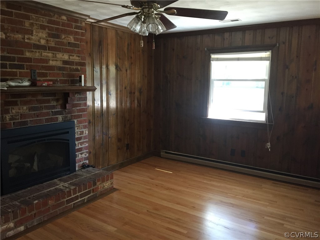 3940 Eugene Road Henrico, VA 23231 - Photo 10 of 16 Paneled Family Room with Brick Fireplace/Gas Logs