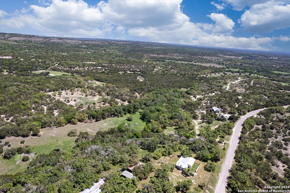 729 Rabbit Road Wimberley, TX 78676 - Photo 27 of 28 an aerial view of residential houses with outdoor space