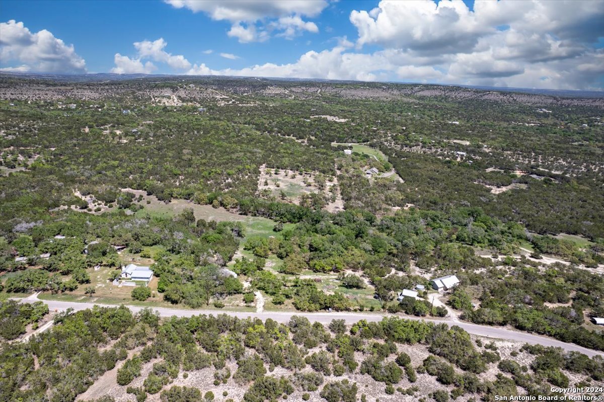 729 Rabbit Road Wimberley, TX 78676 - Photo 6 of 28 a view of a city with mountains in the background