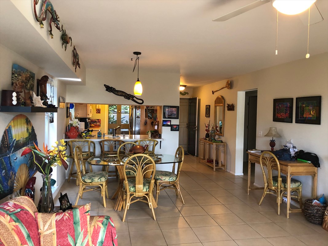 68-1745 Waikoloa Road, Unit J101 Waikoloa, HI 96738 - Photo 1 of 5 a view of a dining room with furniture