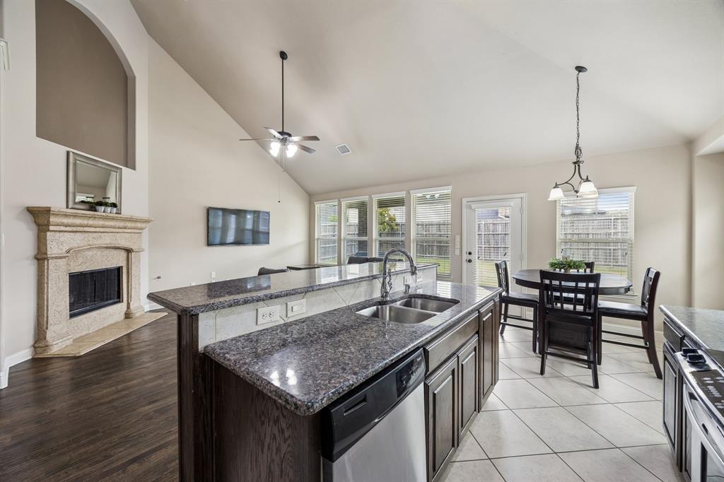 1014 Dunhill Lane Forney, TX 75126 - Photo 38 of 38 Looking into the open floor plan from the kitchen