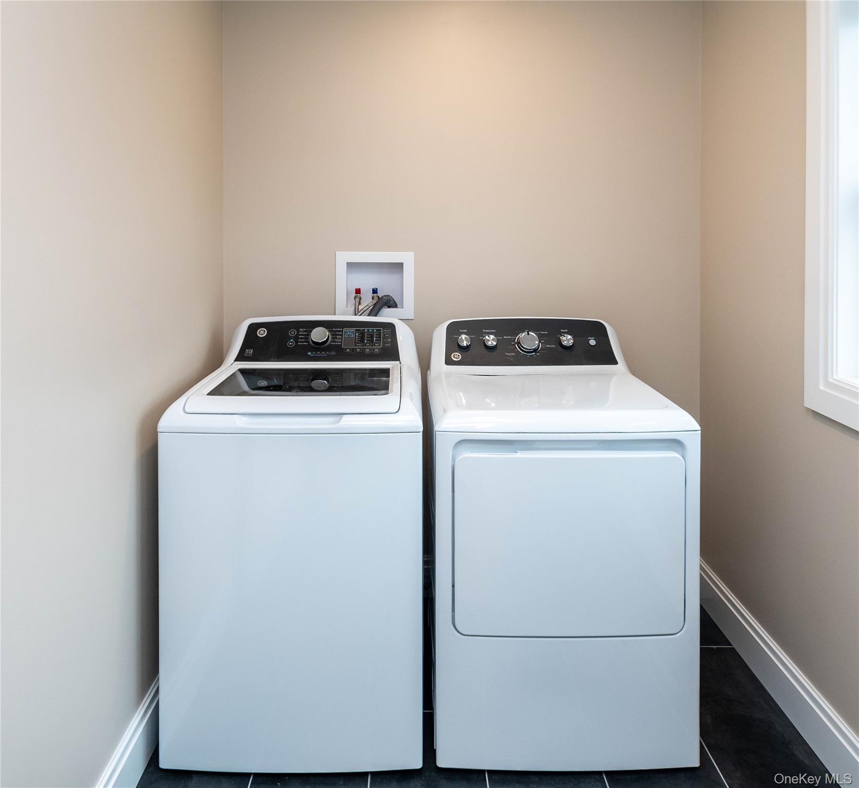 4407 Albany Post Road Hyde Park, NY 12538 - Photo 13 of 44 a utility room with dryer and washer