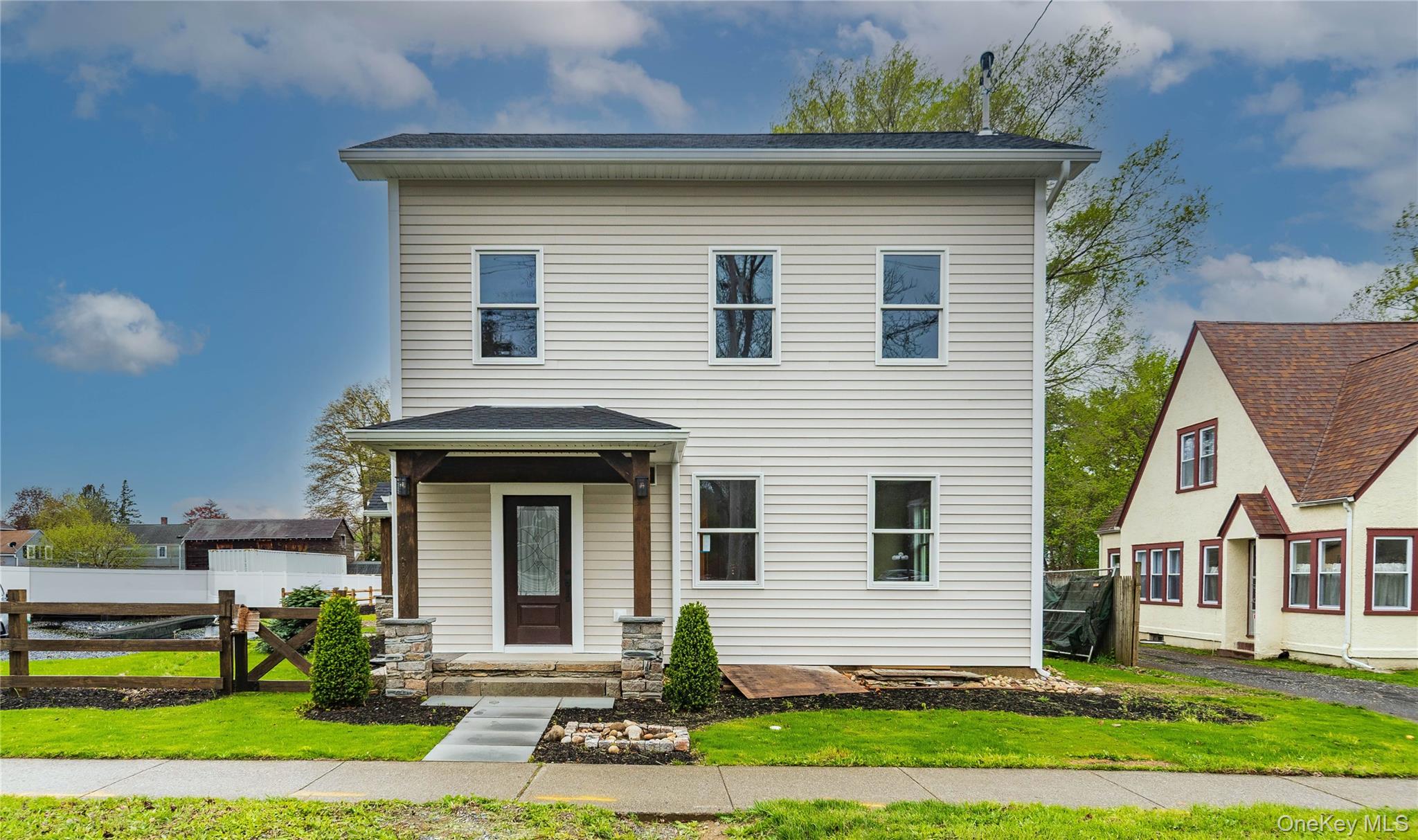 4407 Albany Post Road Hyde Park, NY 12538 - Photo 2 of 44 a front view of a house with a yard