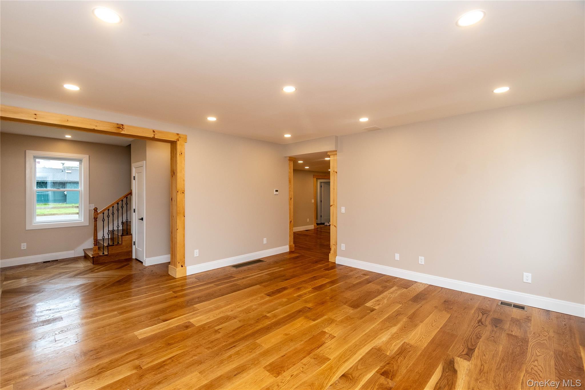 4407 Albany Post Road Hyde Park, NY 12538 - Photo 25 of 44 a view of an empty room with wooden floor and a window