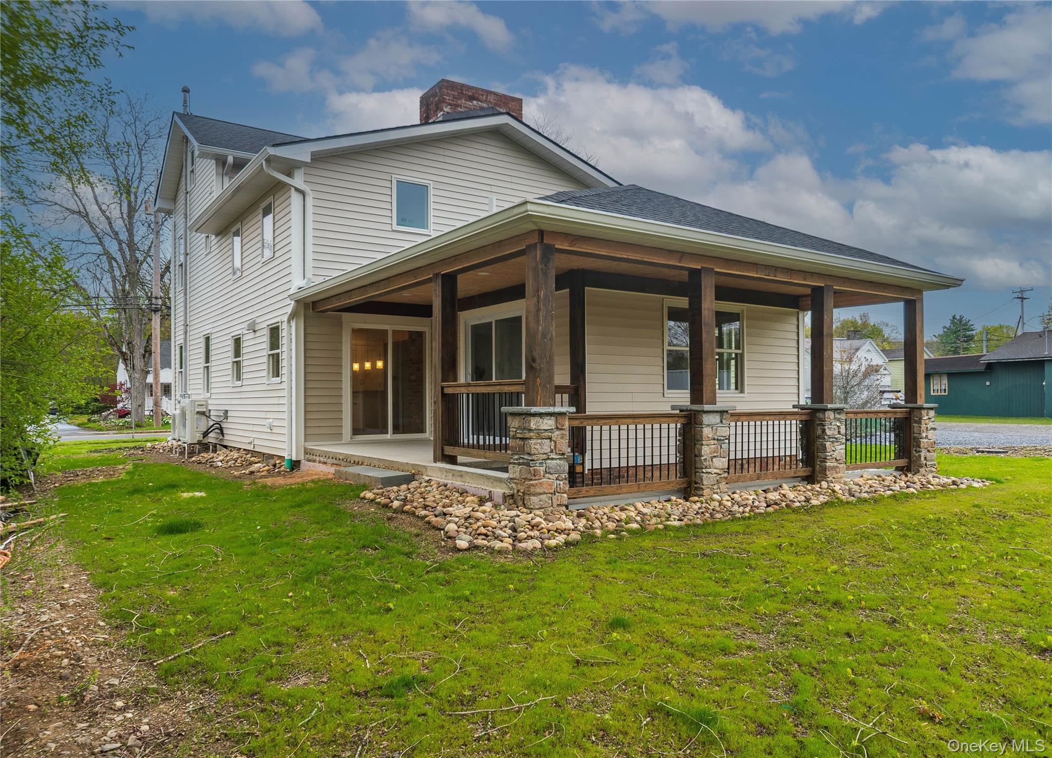 4407 Albany Post Road Hyde Park, NY 12538 - Photo 9 of 44 a front view of a house with a garden