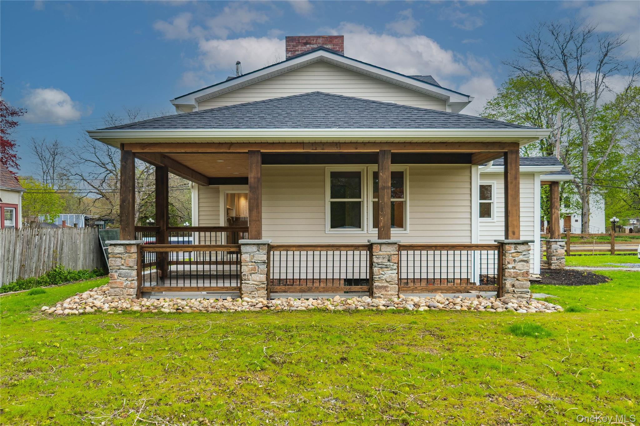 4407 Albany Post Road Hyde Park, NY 12538 - Photo 10 of 44 a front view of a house with garden