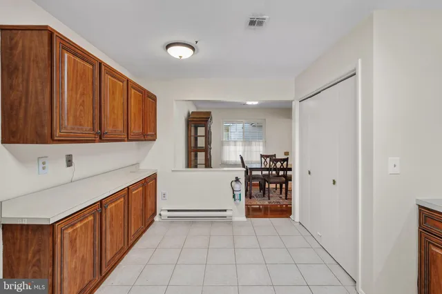 a view of utility room with closet