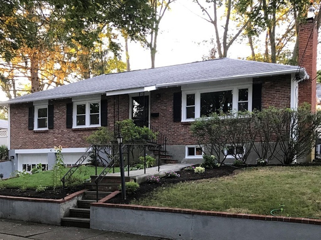 43 Kendall Road Newton, MA 02459 - Photo 1 of 22 a front view of a house with a yard