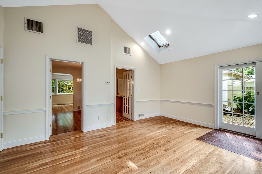 43 Kendall Road Newton, MA 02459 - Photo 12 of 22 a view of an empty room with wooden floor and a window