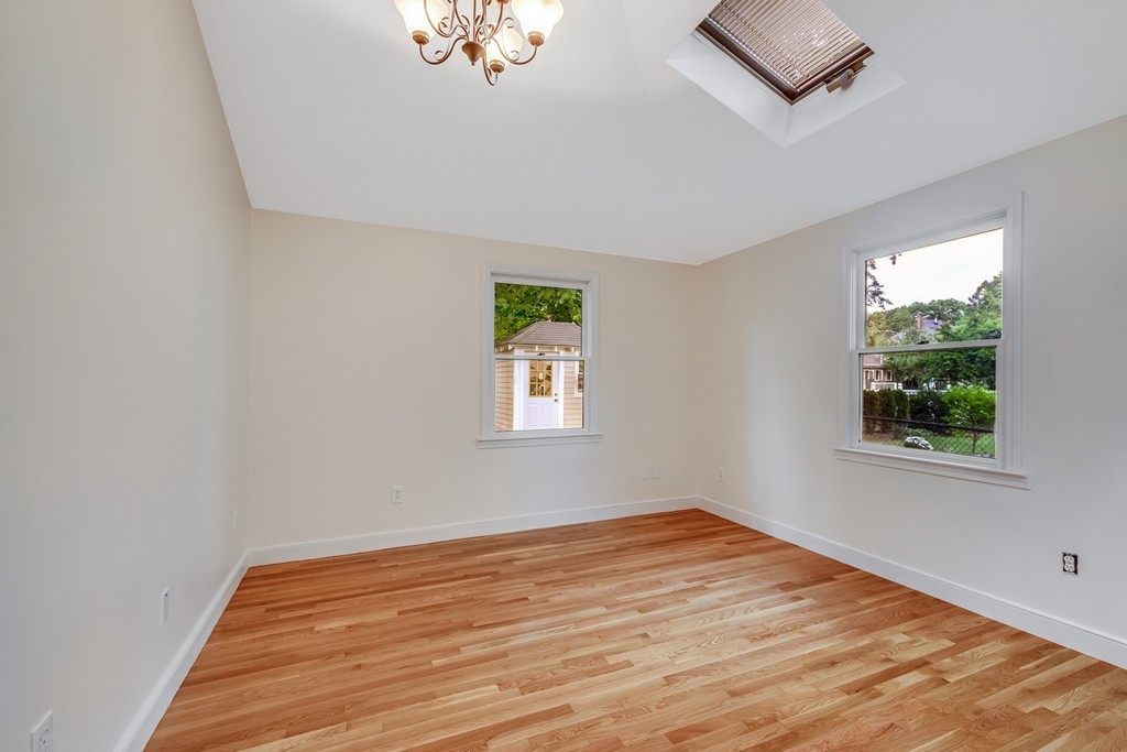 43 Kendall Road Newton, MA 02459 - Photo 13 of 22 a view of empty room with wooden floor and fan