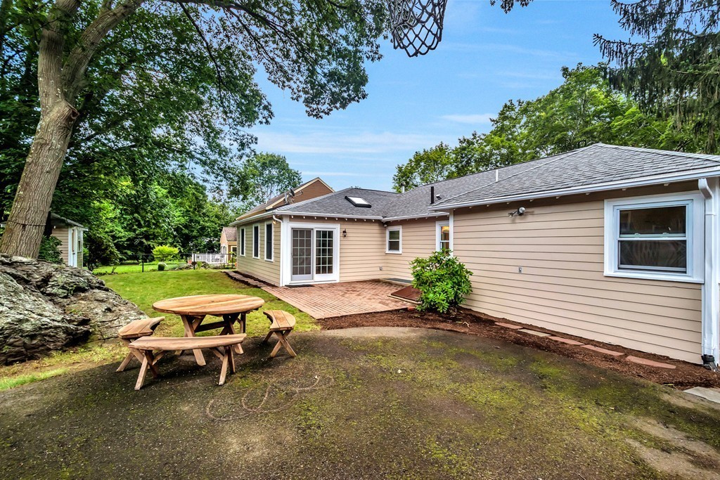 43 Kendall Road Newton, MA 02459 - Photo 20 of 22 a view of a house with backyard and a tree