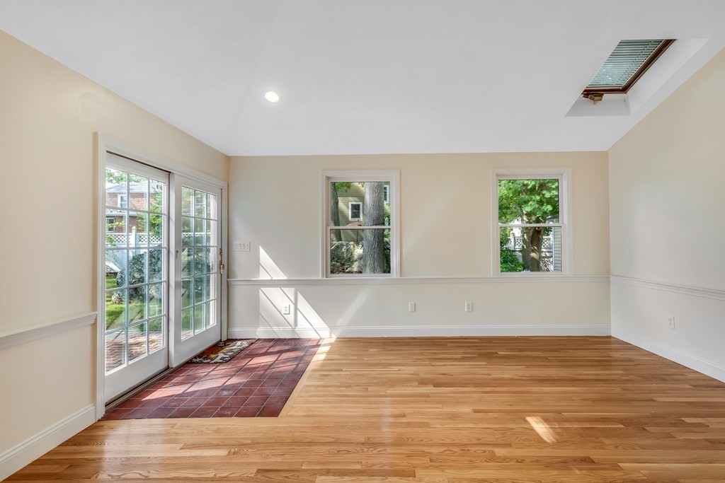 43 Kendall Road Newton, MA 02459 - Photo 10 of 22 a view of empty room with wooden floor and fan