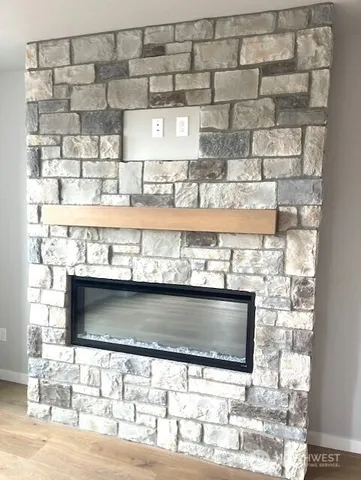 a stove top oven sitting inside of a kitchen