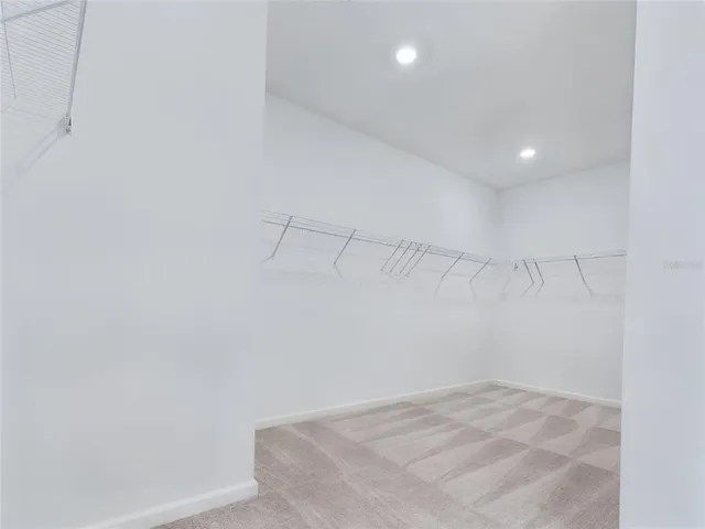 a view of a room with racks on the wall