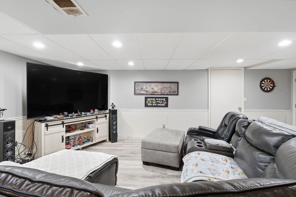 240 Horizon Way Fall River, MA 02720 - Photo 7 of 41 a living room with furniture and a flat screen tv