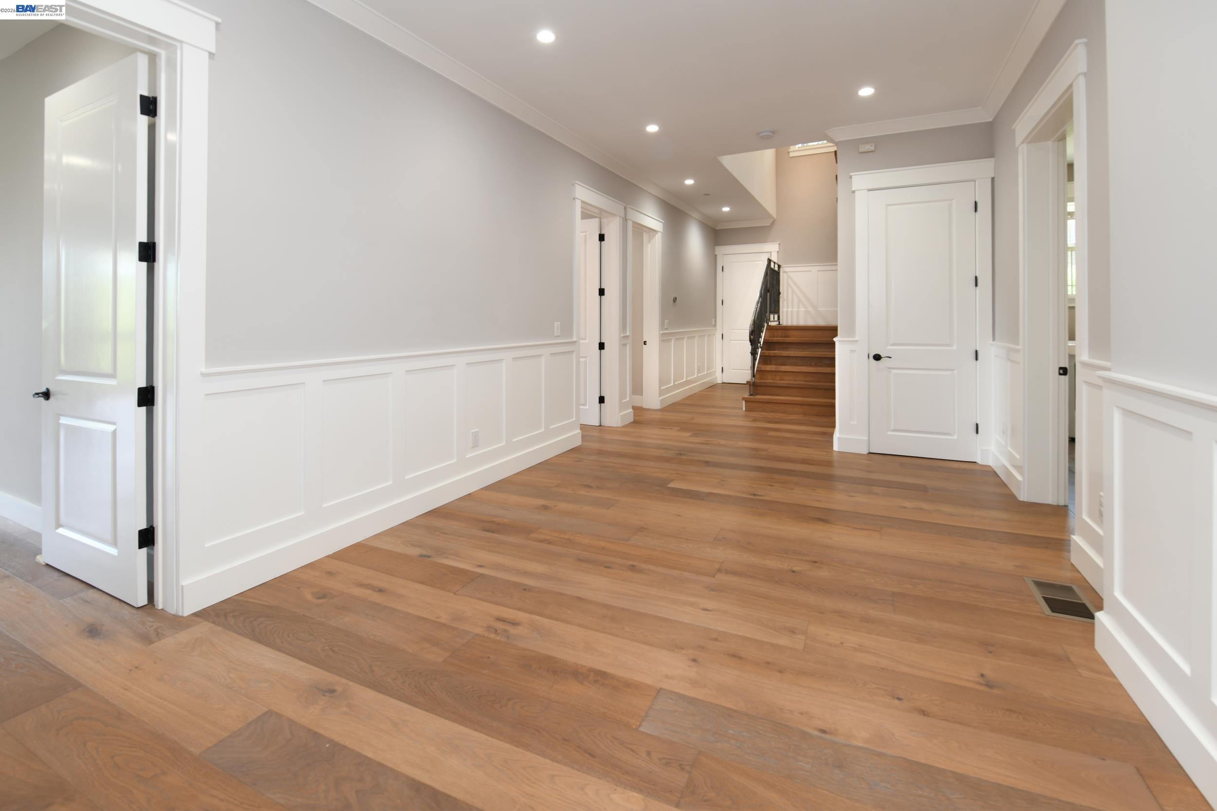 1516 Pleasant Hill Road Lafayette, CA 94549 - Photo 10 of 38 an empty room with wooden floor and windows