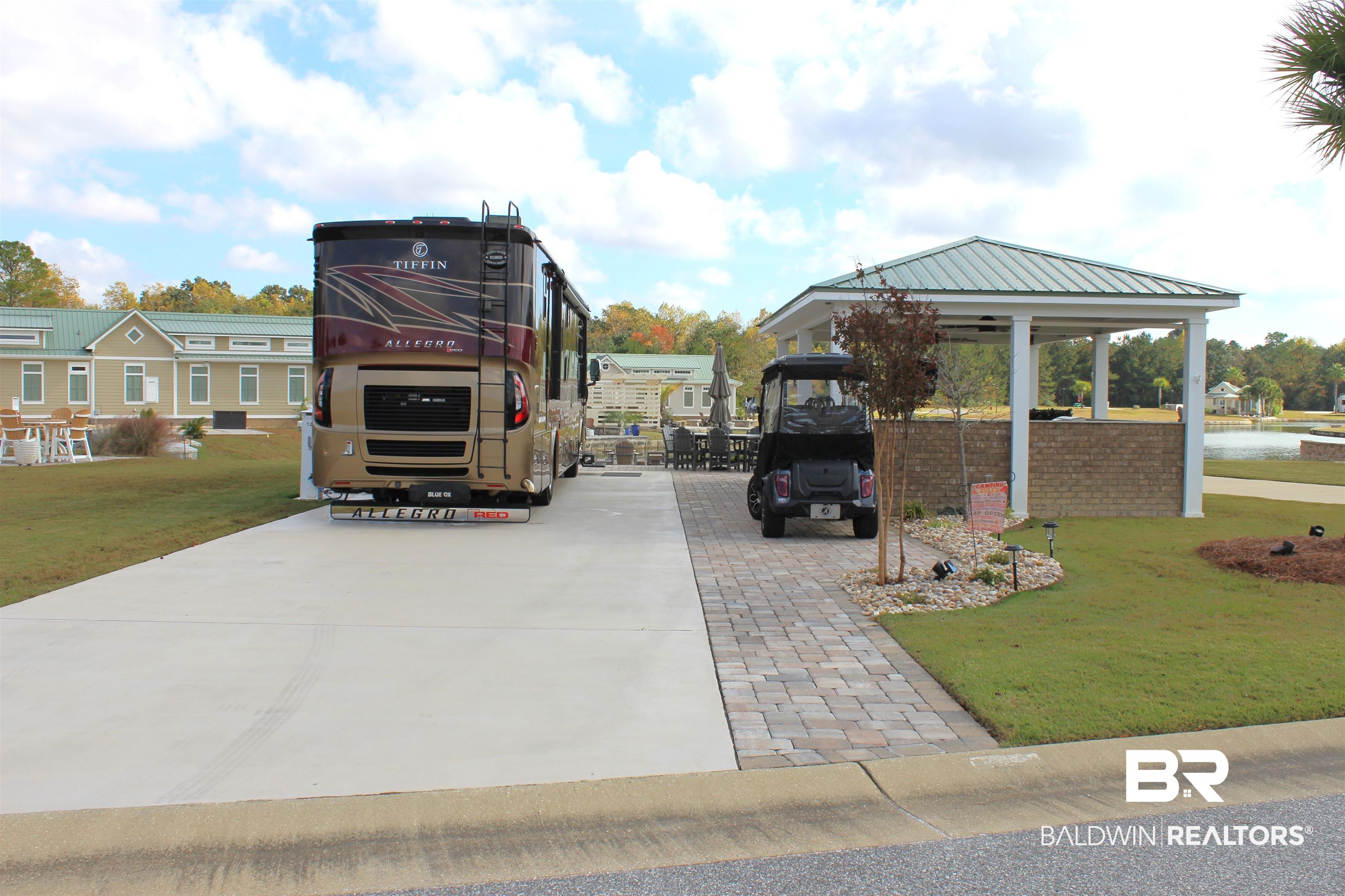 28238 Migratory Way Elberta, AL 36530 - Photo 4 of 58 View of parking / parking lot with a water view