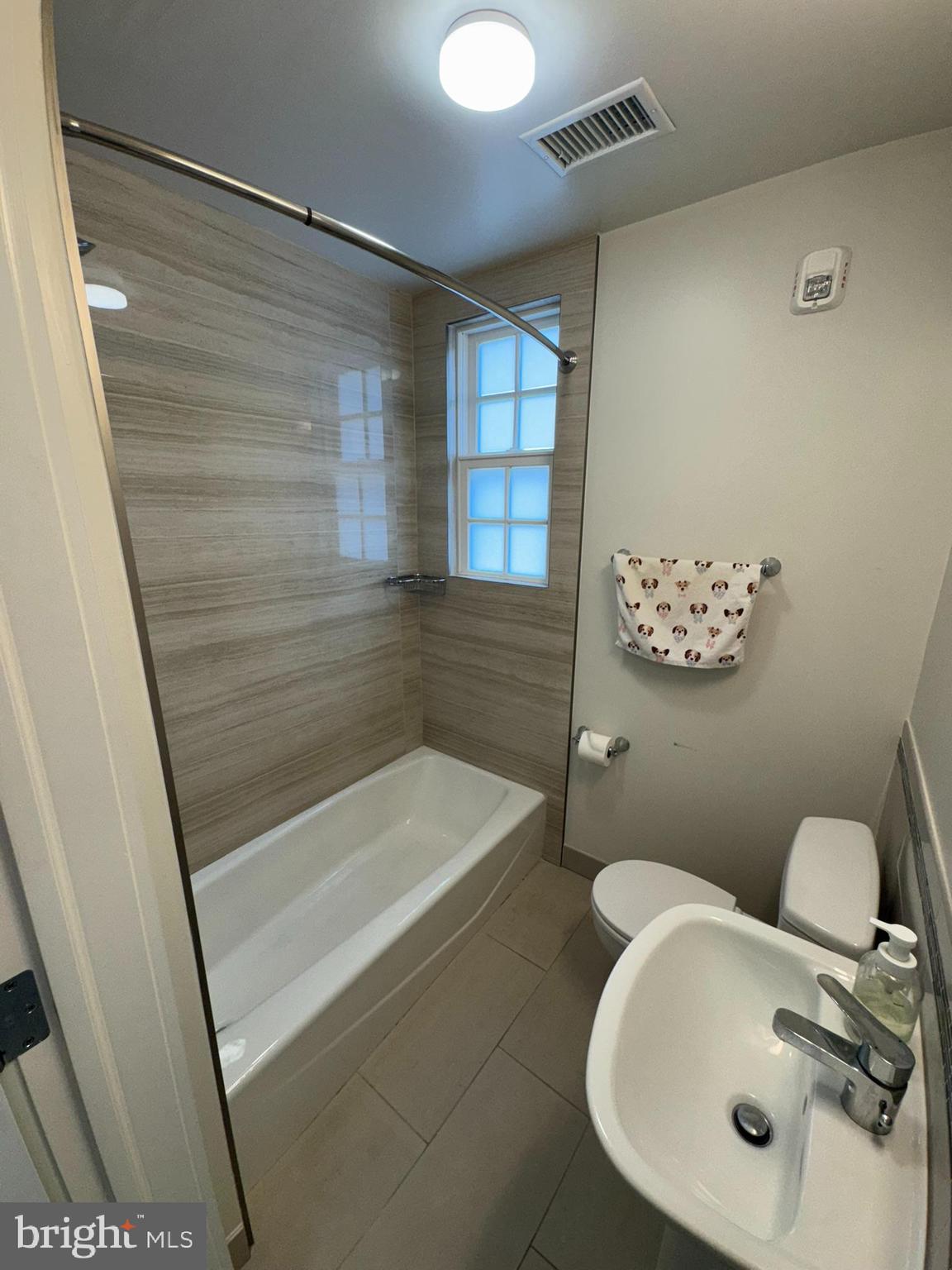 205 Witherspoon Street, Unit 3 Princeton, NJ 08542 - Photo 4 of 8 a bathroom with a sink and a mirror