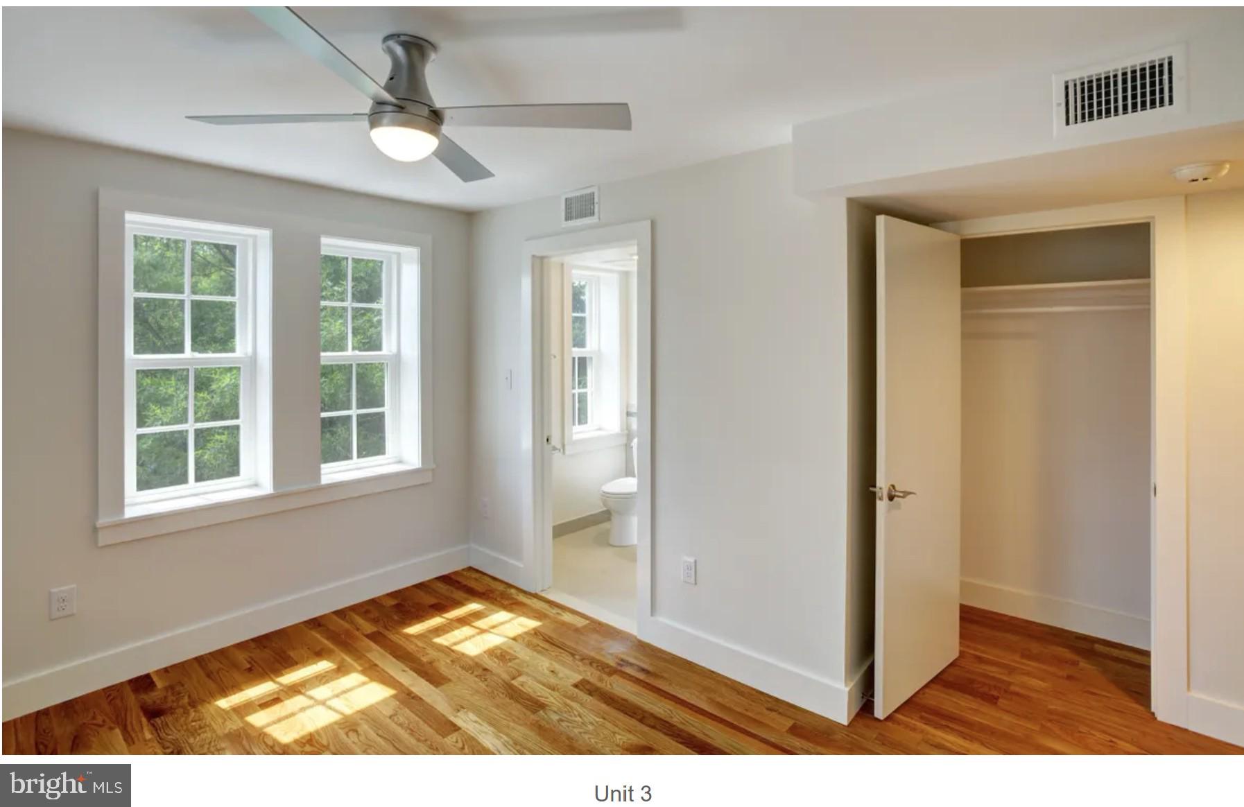 205 Witherspoon Street, Unit 3 Princeton, NJ 08542 - Photo 5 of 8 a view of empty room with wooden floor and fan