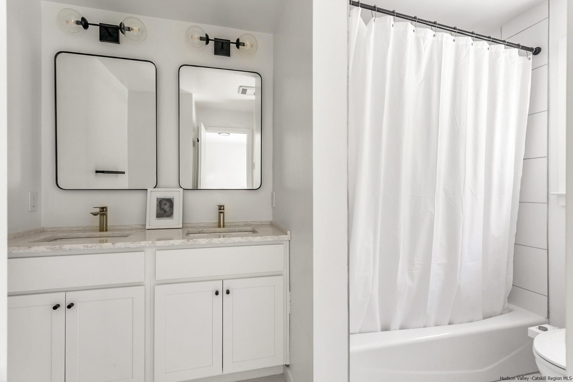 17 Freeman Avery Road Olivebridge, NY 12461 - Photo 11 of 32 a bathroom with a granite countertop sink vanity mirror and toilet