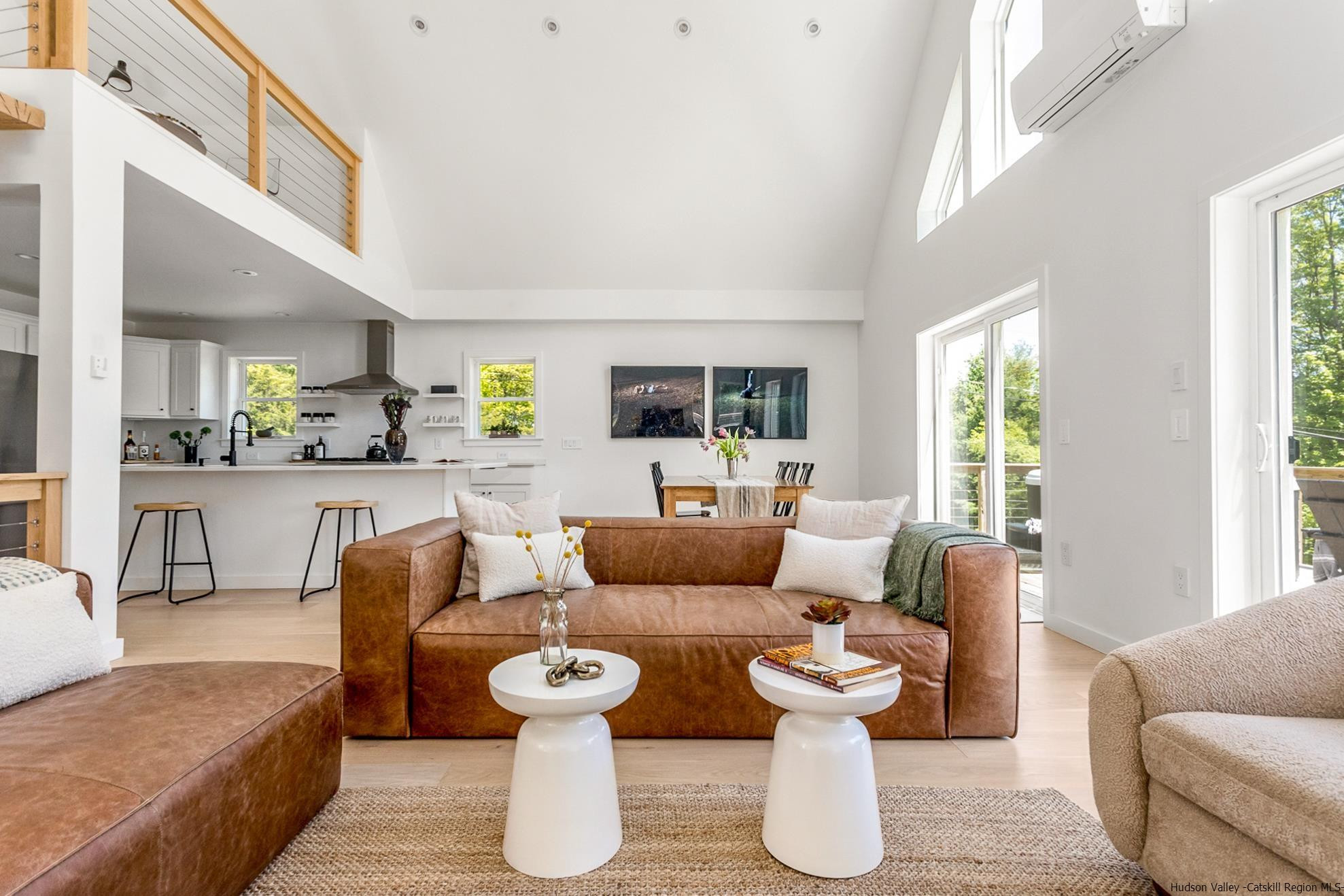 17 Freeman Avery Road Olivebridge, NY 12461 - Photo 12 of 32 a living room with furniture and a large window