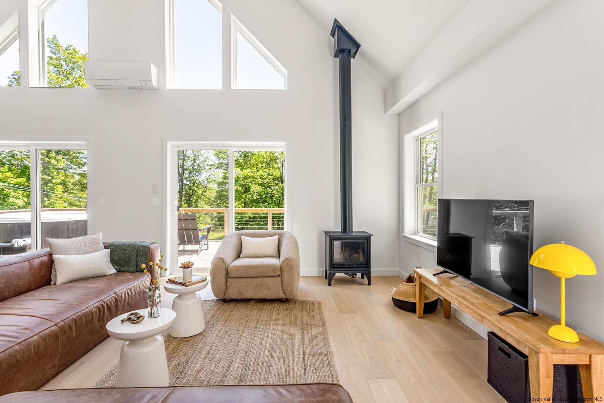 17 Freeman Avery Road Olivebridge, NY 12461 - Photo 14 of 32 a living room with furniture fireplace and a large window