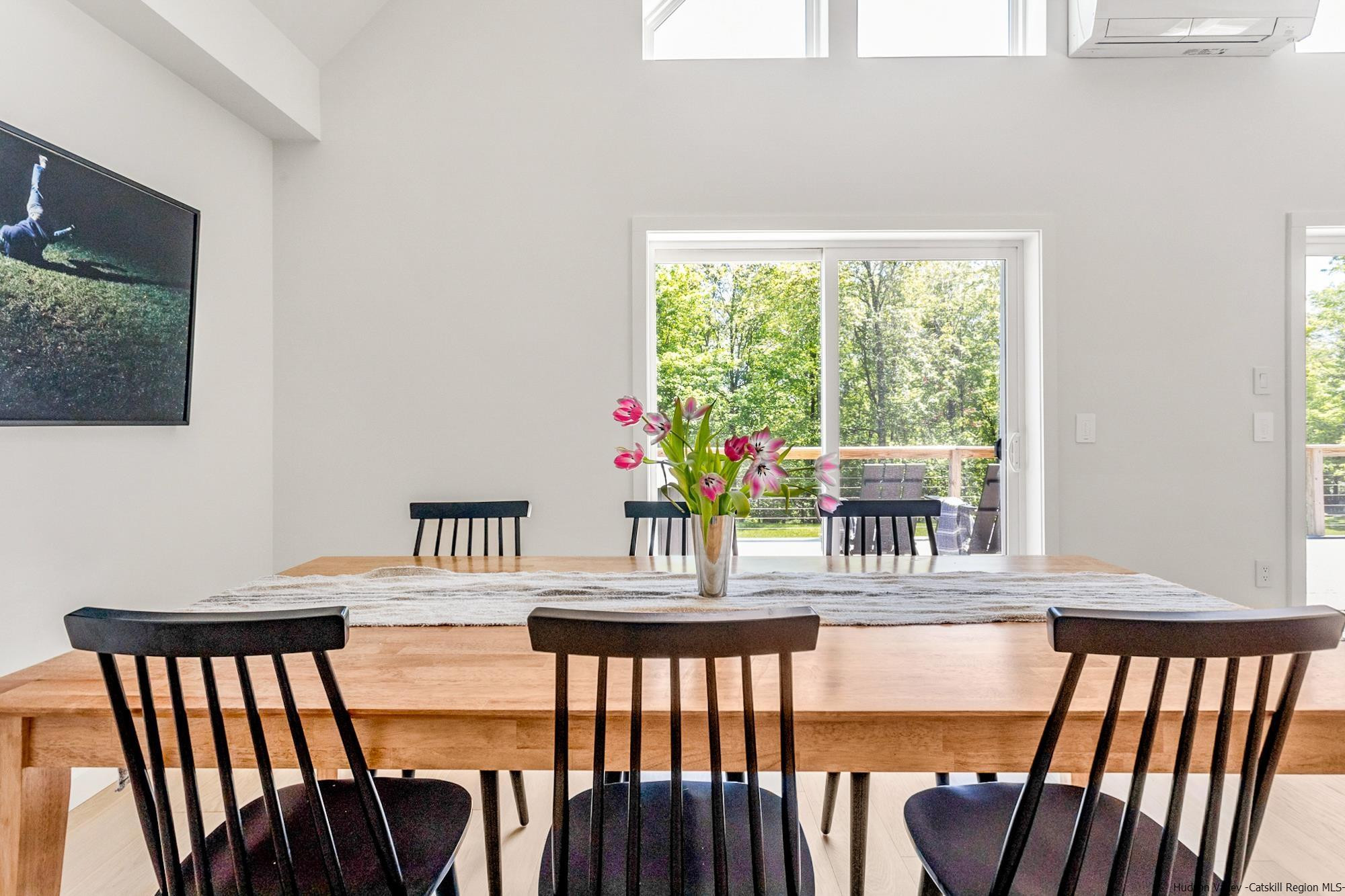 17 Freeman Avery Road Olivebridge, NY 12461 - Photo 18 of 32 a view of a dining room with furniture a chandelier and wooden floor