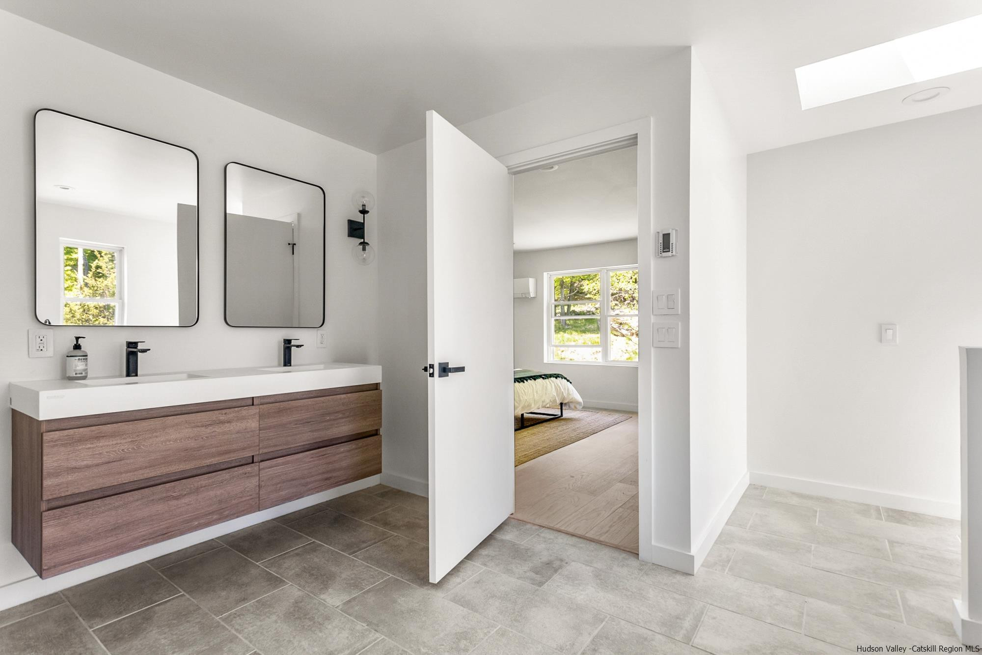 17 Freeman Avery Road Olivebridge, NY 12461 - Photo 21 of 32 a bathroom with a sink and mirror