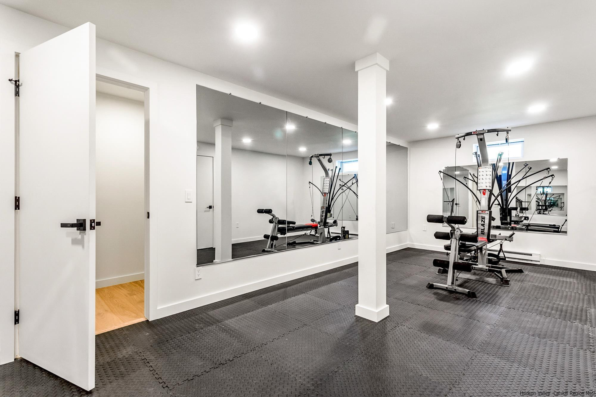 17 Freeman Avery Road Olivebridge, NY 12461 - Photo 27 of 32 a view of a room with gym equipment