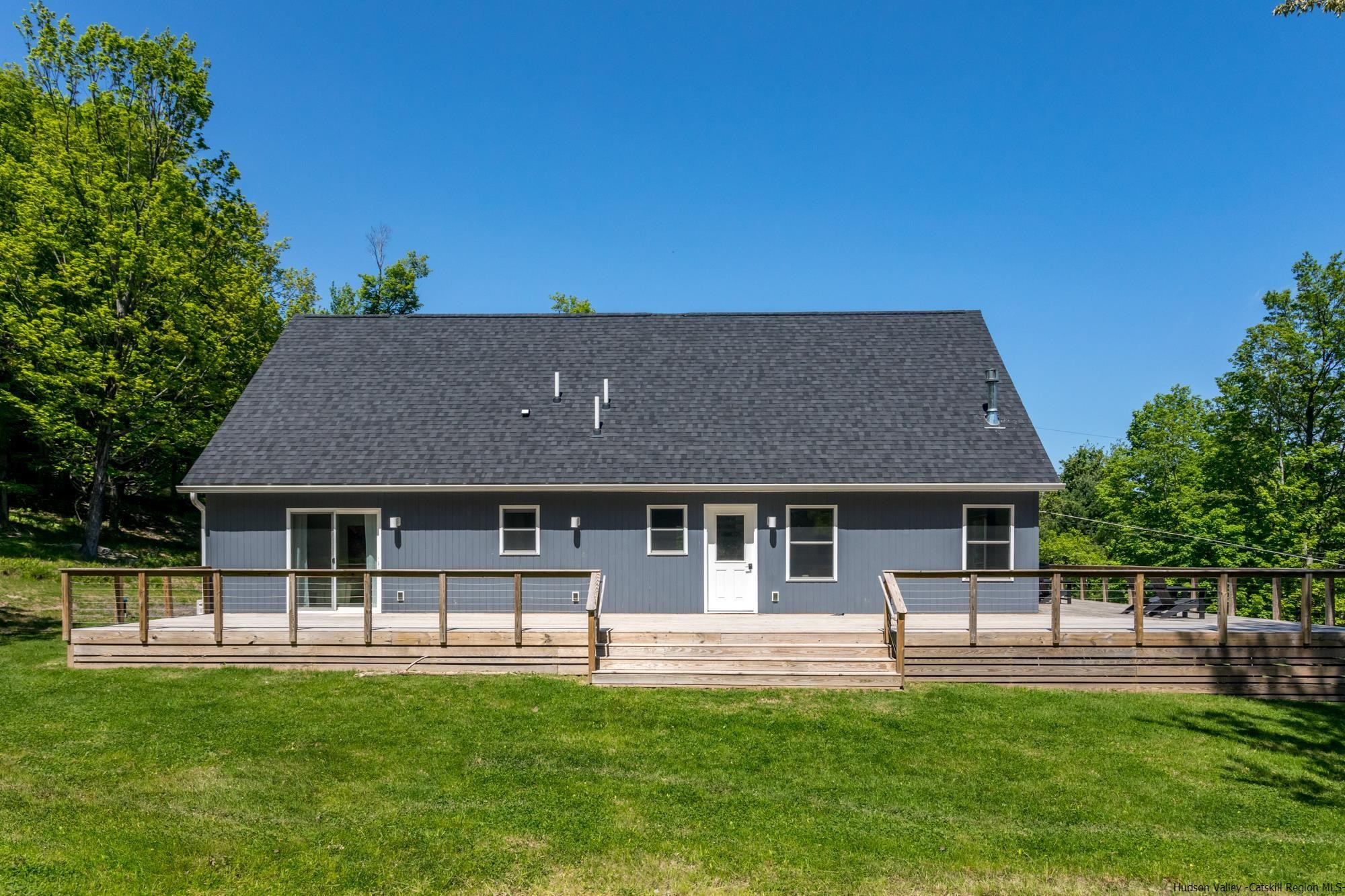 17 Freeman Avery Road Olivebridge, NY 12461 - Photo 30 of 32 a front view of a house with a garden and yard