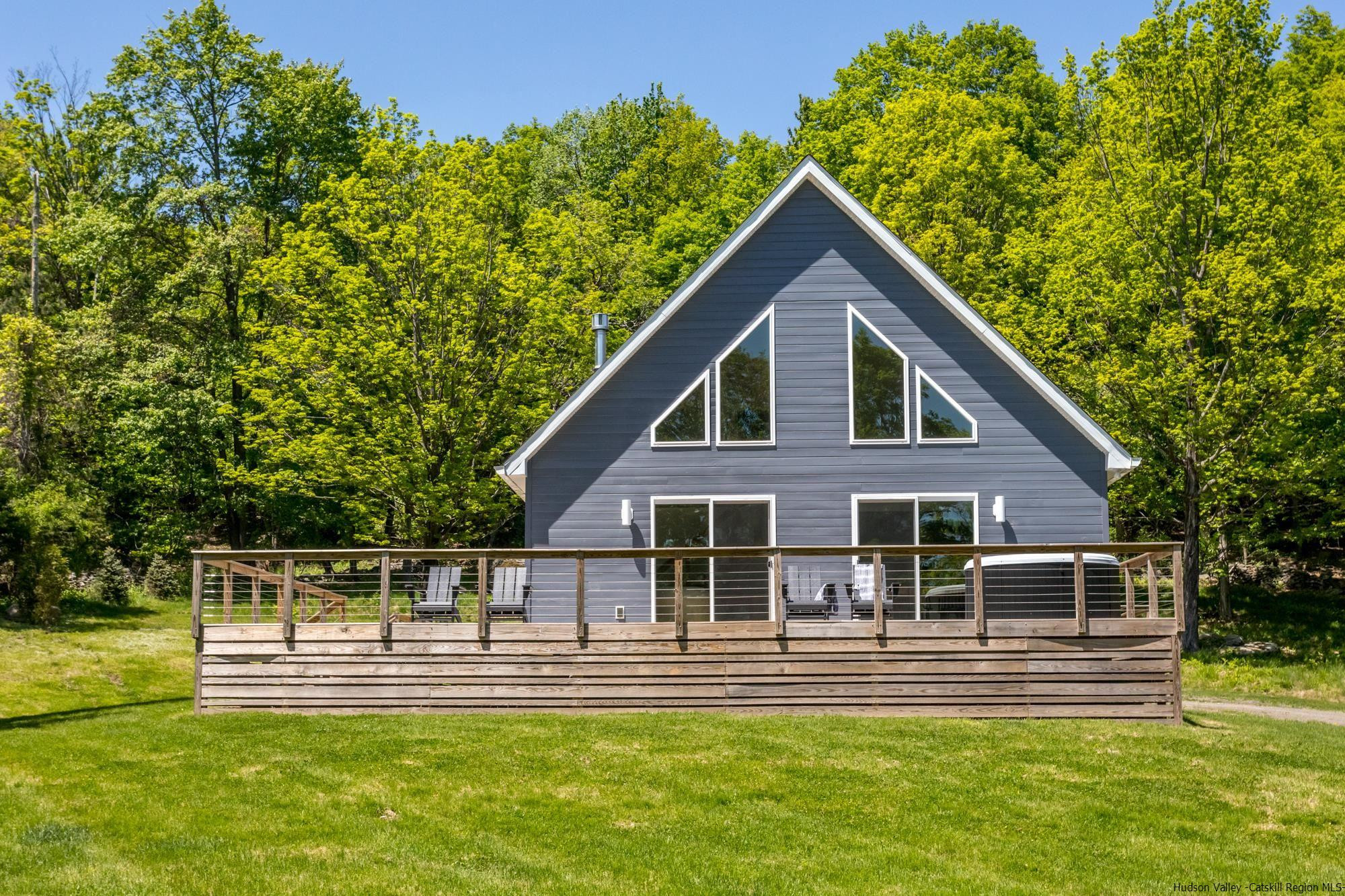17 Freeman Avery Road Olivebridge, NY 12461 - Photo 32 of 32 a front view of a house with a yard table and chairs