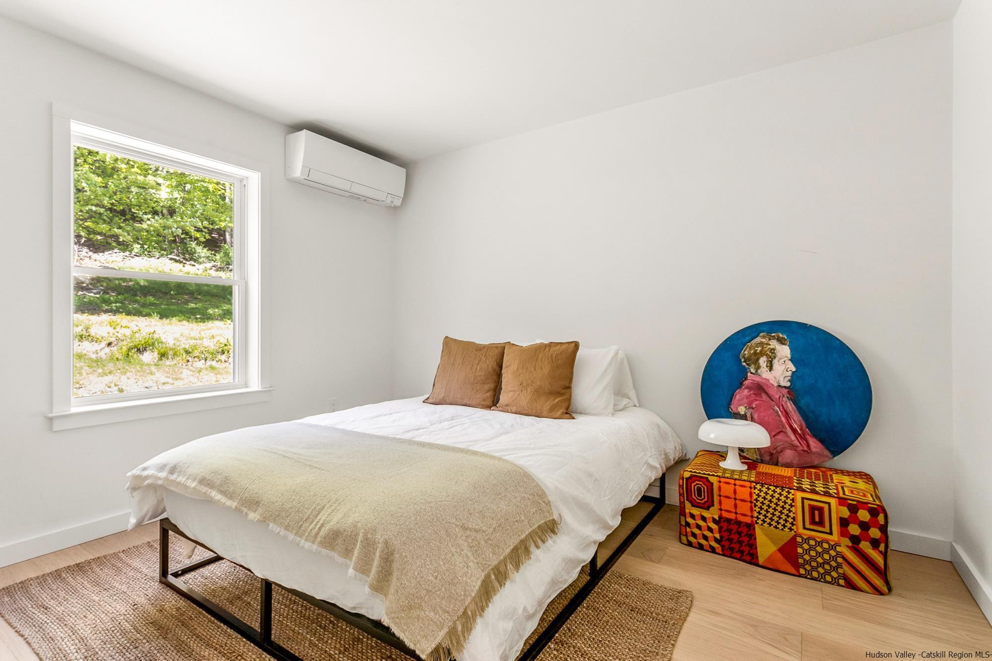 17 Freeman Avery Road Olivebridge, NY 12461 - Photo 9 of 32 a bedroom with a bed and a painting on the wall