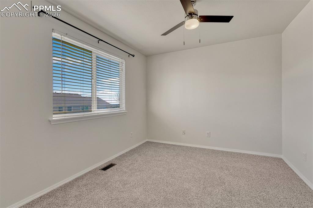 2580 Malpaso Point Colorado Springs, CO 80922 - Photo 13 of 23 an empty room with a window