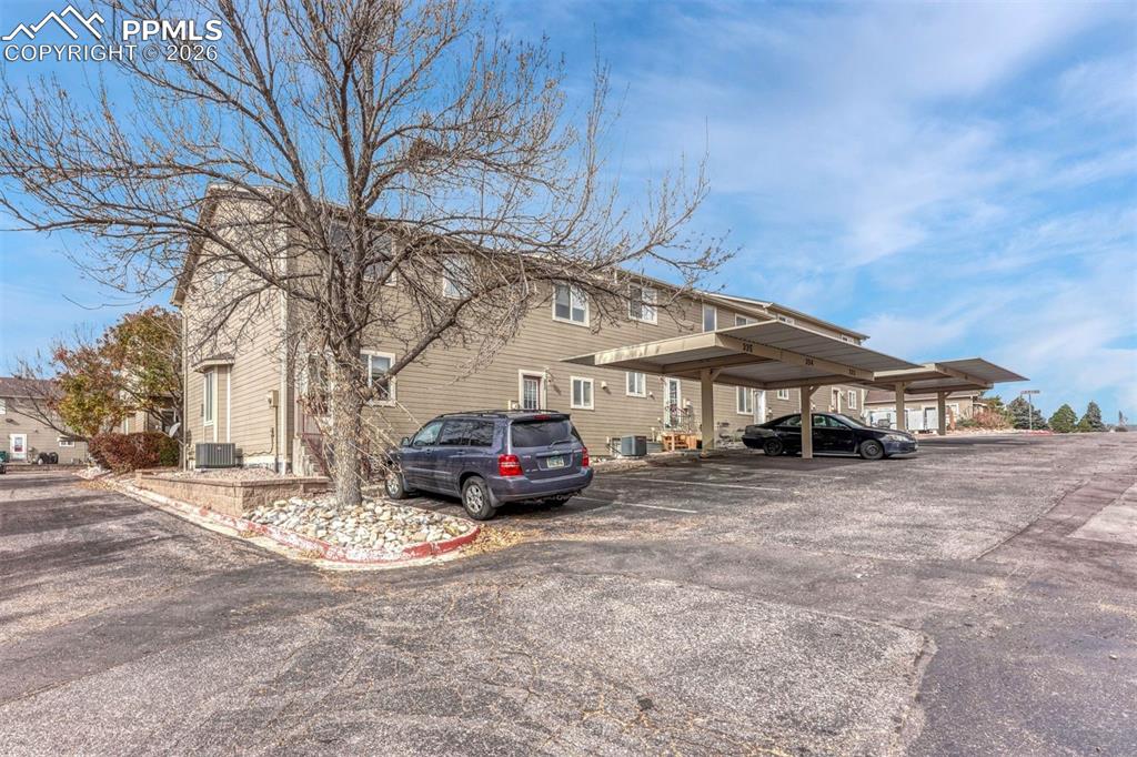 2580 Malpaso Point Colorado Springs, CO 80922 - Photo 23 of 23 a car parked in front of a house