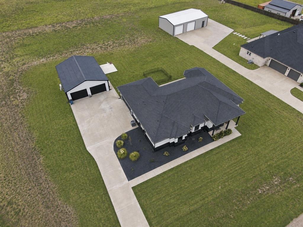 140 Lone Elm Road Midlothian, TX 76065 - Photo 2 of 36 Aerial view showcasing the expansive 1-acre property.