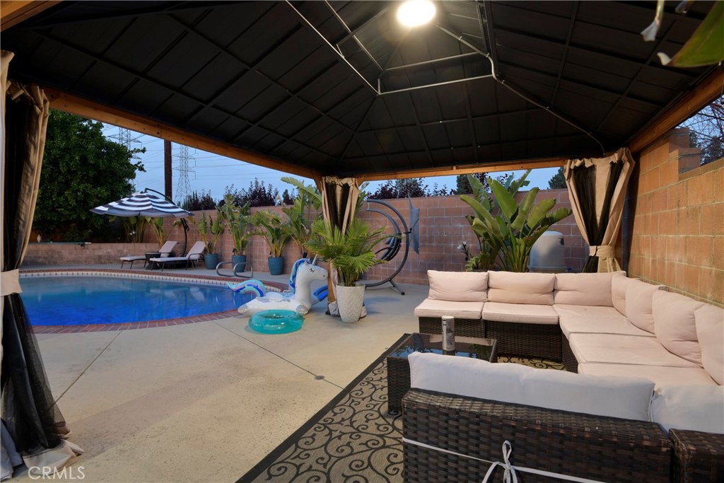 9728 Rhea Avenue Northridge, CA 91324 - Photo 31 of 36 a view of an outdoor dining space with furniture