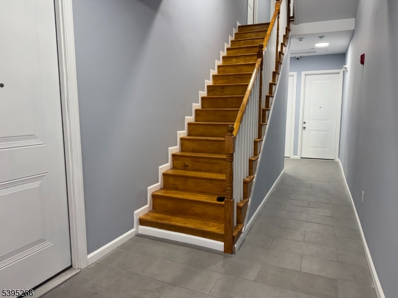 155 Clifton Avenue, Unit 3RR Newark, NJ 07104 - Photo 12 of 13 a view of entryway with wooden floor