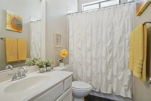 a front view of a house with chairs