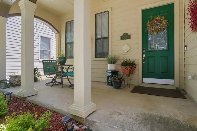 a view of livingroom with furniture and floor to ceiling window