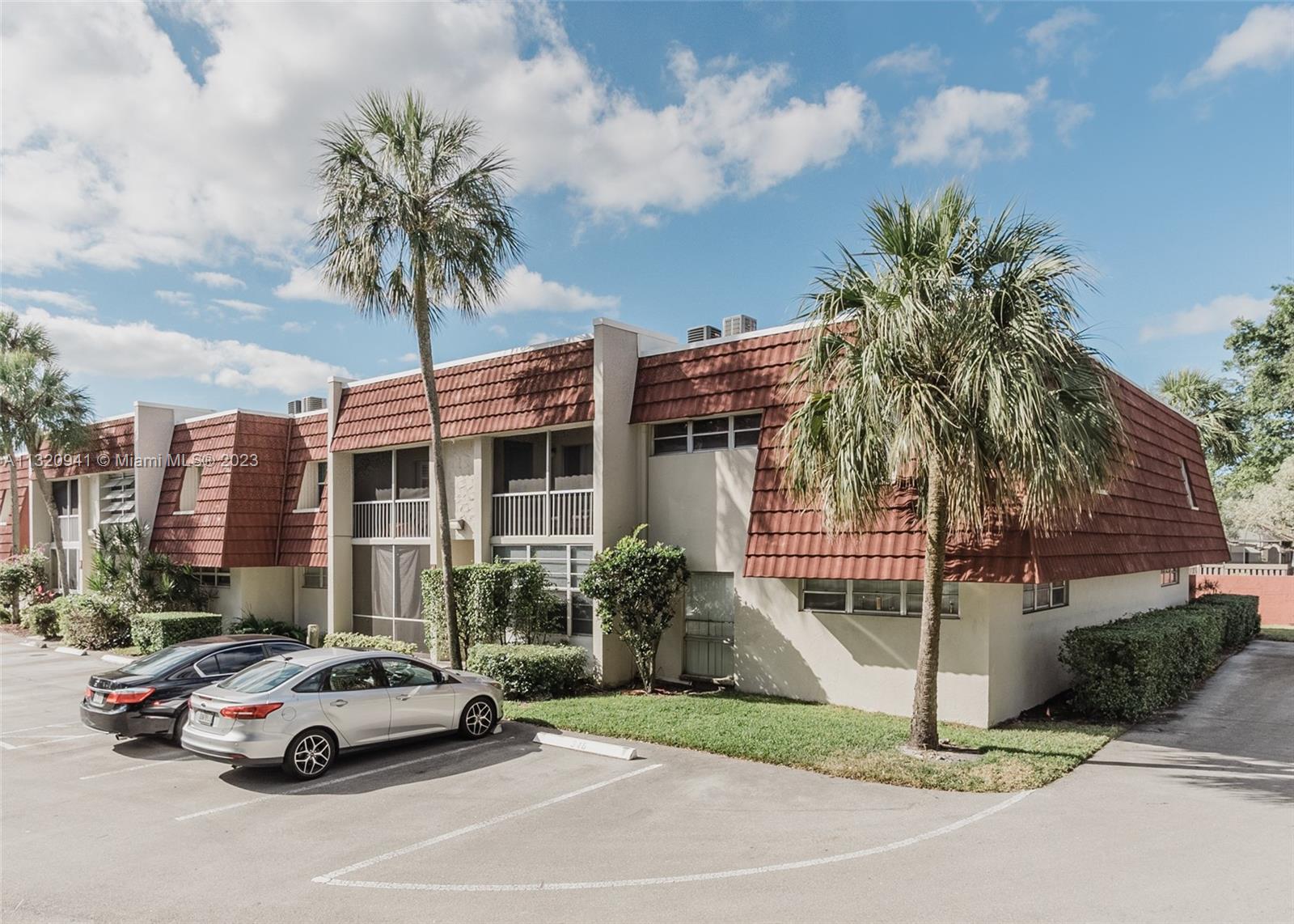 Jacaranda Plantation, FL 33324 - Photo 22 of 22 a car parked in front of a house
