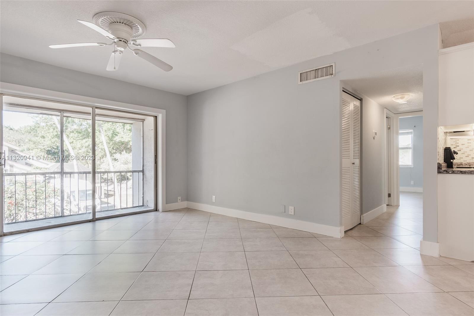 Jacaranda Plantation, FL 33324 - Photo 6 of 22 a view of an empty room with a window