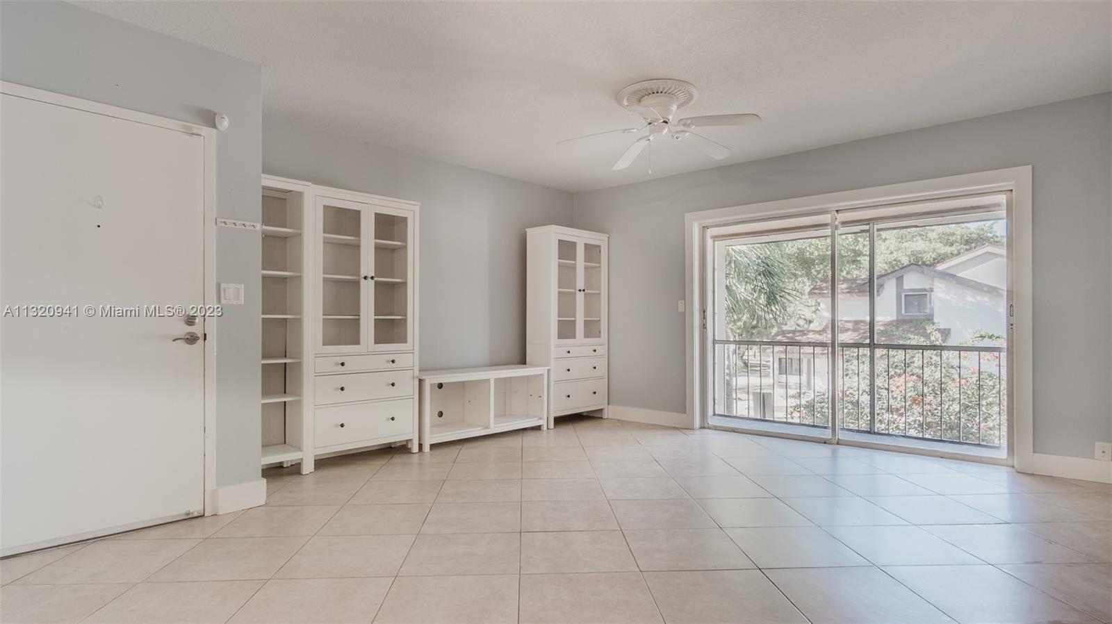 Jacaranda Plantation, FL 33324 - Photo 7 of 22 a view of an empty room with a window