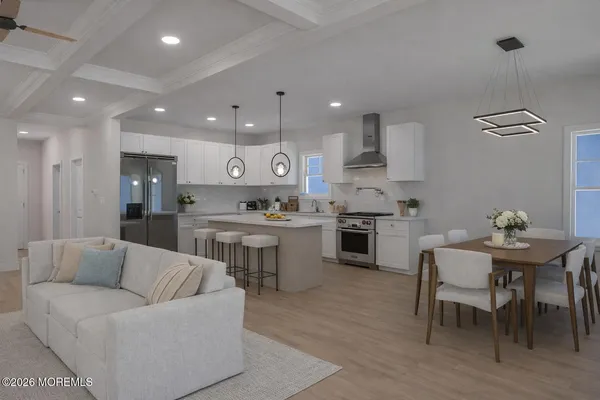 a kitchen with a table and chairs in it