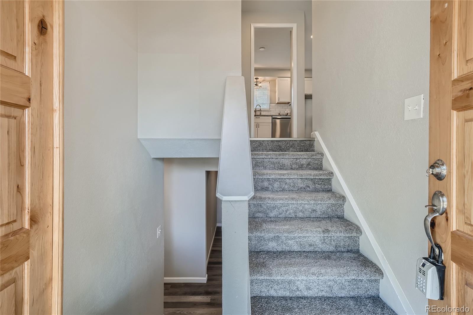 8506 Eaton Street Arvada, CO 80003 - Photo 4 of 28 a view of entryway