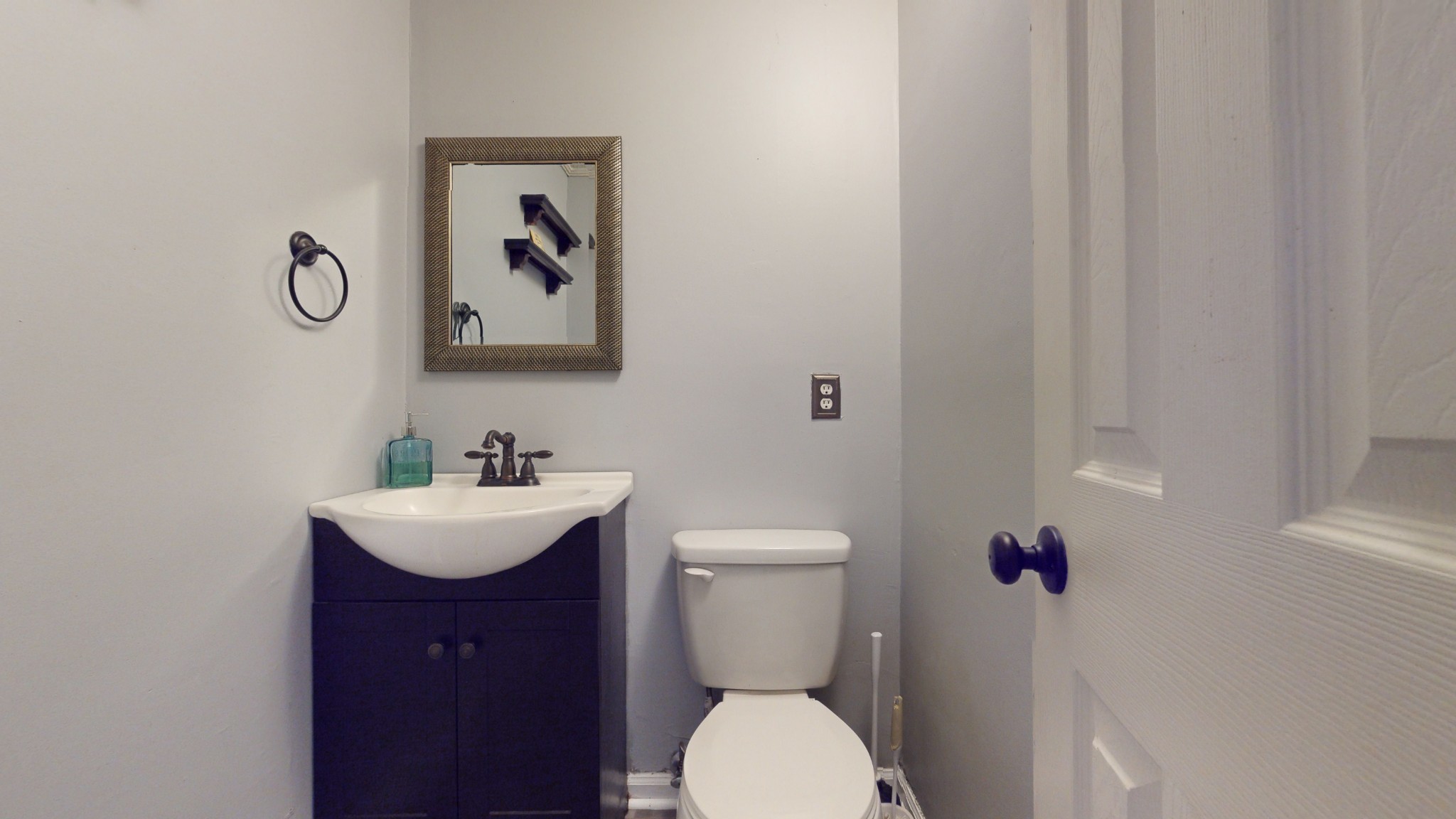 511 Limestone Road Elora, TN 37328 - Photo 23 of 55 a bathroom with a toilet a sink and mirror