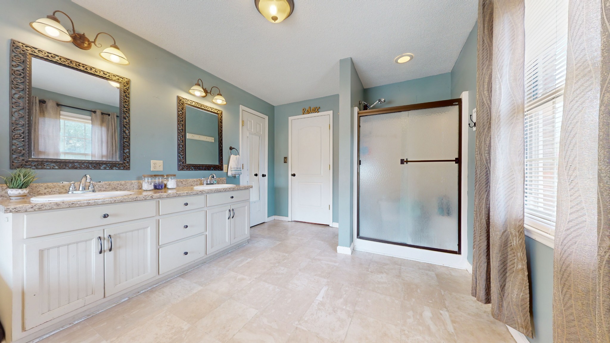 511 Limestone Road Elora, TN 37328 - Photo 30 of 55 a spacious bathroom with a granite countertop sink mirror and a